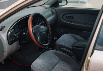 Подержанный автомобиль Kia Spectra Sedan 2007 года (9 фото)