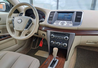 Подержанный автомобиль Nissan Teana 2011 года (10 фото)