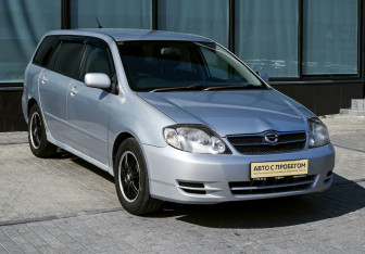 Подержанный автомобиль Toyota Corolla Wagon 2002 года (7 фото)