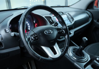 Подержанный автомобиль Kia Sportage 2013 года (9 фото)