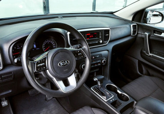 Подержанный автомобиль Kia Sportage 2018 года (15 фото)
