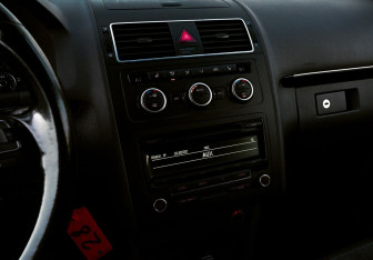 Подержанный автомобиль Volkswagen Touran 2012 года (11 фото)