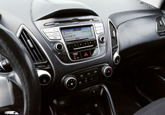 Подержанный автомобиль Hyundai ix35 2010 года (10 фото)