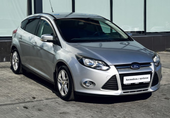 Подержанный автомобиль Ford Focus Hatchback 2011 года (7 фото)