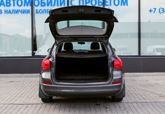Подержанный автомобиль Opel Astra Wagon 2012 года (18 фото)