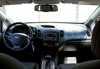 Подержанный автомобиль Kia Cerato Sedan 2013 года (18 фото)