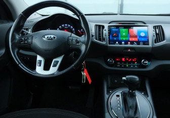 Подержанный автомобиль Kia Sportage 2013 года (10 фото)