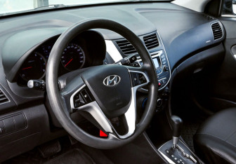Подержанный автомобиль Hyundai Solaris Sedan 2011 года (15 фото)