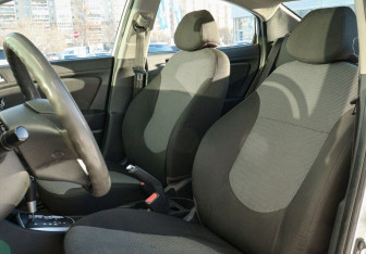 Подержанный автомобиль Hyundai Solaris Sedan 2013 года (16 фото)