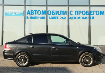 Подержанный автомобиль Opel Astra Sedan 2011 года (6 фото)