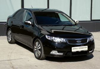 Подержанный автомобиль Kia Cerato Sedan 2012 года (7 фото)