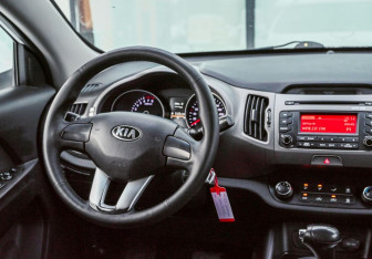 Подержанный автомобиль Kia Sportage 2014 года (11 фото)