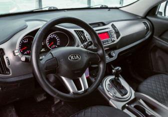 Подержанный автомобиль Kia Sportage 2014 года (10 фото)