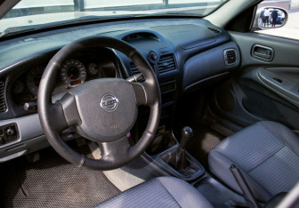 Подержанный автомобиль Nissan Almera Classic 2007 года (13 фото)