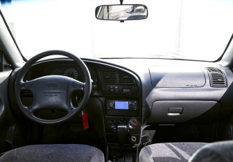 Подержанный автомобиль Kia Spectra Sedan 2007 года (16 фото)