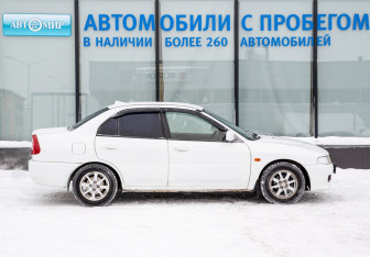 Подержанный автомобиль Mitsubishi Lancer Sedan 2000 года (7 фото)