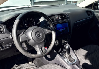 Подержанный автомобиль Volkswagen Jetta Sedan 2014 года (13 фото)