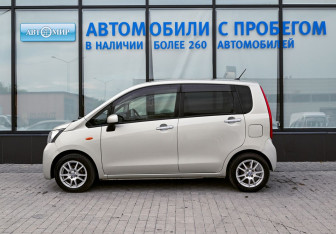 Подержанный автомобиль Daihatsu Move 2013 года (2 фото)