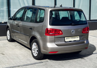 Подержанный автомобиль Volkswagen Touran 2012 года (3 фото)