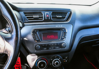 Подержанный автомобиль Kia Rio Sedan 2013 года (12 фото)