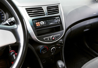 Подержанный автомобиль Hyundai Solaris Sedan 2013 года (10 фото)