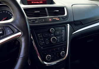 Подержанный автомобиль Opel Mokka 2013 года (11 фото)