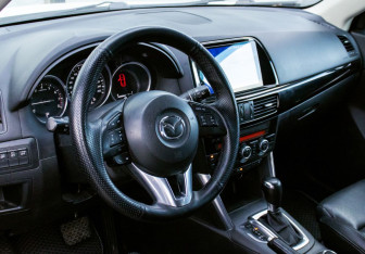 Подержанный автомобиль Mazda CX-5 2014 года (15 фото)