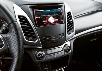 Подержанный автомобиль SsangYong Actyon 2014 года (10 фото)