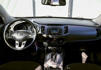 Подержанный автомобиль Kia Sportage 2014 года (18 фото)