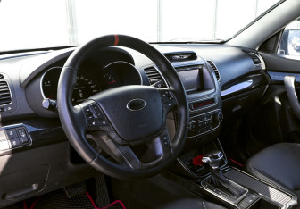 Подержанный автомобиль Kia Sorento 2013 года (15 фото)
