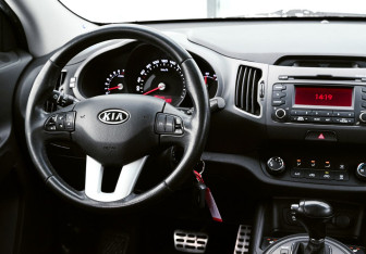 Подержанный автомобиль Kia Sportage 2012 года (11 фото)