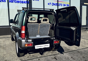 Подержанный автомобиль Suzuki Jimny 1998 года (19 фото)