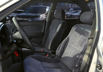 Подержанный автомобиль Kia Spectra Sedan 2007 года (14 фото)