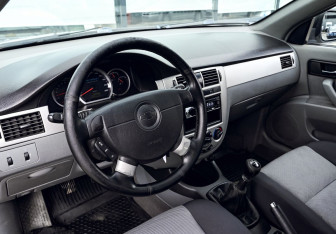 Подержанный автомобиль Chevrolet Lacetti Sedan 2011 года (14 фото)