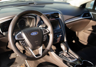 Подержанный автомобиль Ford Mondeo Sedan 2015 года (14 фото)