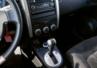 Подержанный автомобиль Nissan X-Trail 2012 года (9 фото)