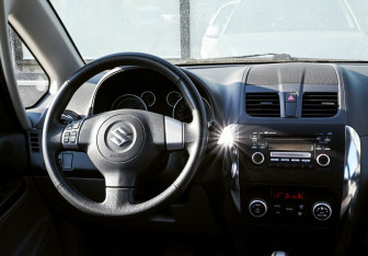 Подержанный автомобиль Suzuki SX4 Sedan 2011 года (18 фото)