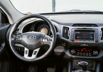 Подержанный автомобиль Kia Sportage 2011 года (11 фото)