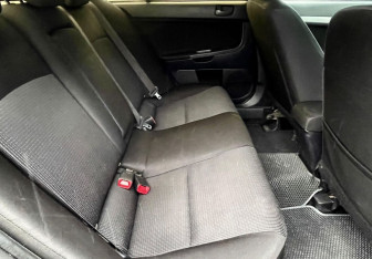 Подержанный автомобиль Mitsubishi Lancer Sedan 2010 года (16 фото)