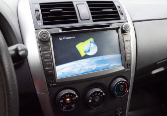 Подержанный автомобиль Toyota Corolla Sedan 2012 года (12 фото)