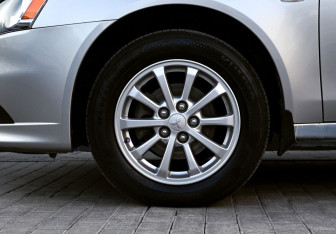 Подержанный автомобиль Mitsubishi Lancer Sedan 2013 года (22 фото)