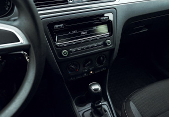 Подержанный автомобиль Skoda Rapid Liftback 2014 года (9 фото)