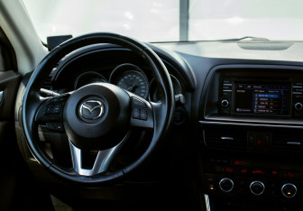 Подержанный автомобиль Mazda CX-5 2014 года (19 фото)