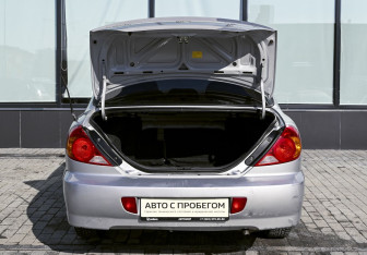 Подержанный автомобиль Kia Spectra Sedan 2007 года (18 фото)