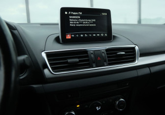 Подержанный автомобиль Mazda 3 Sedan 2014 года (12 фото)