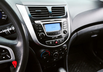 Подержанный автомобиль Hyundai Solaris Hatchback 2011 года (11 фото)