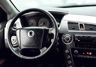 Подержанный автомобиль SsangYong Kyron 2011 года (17 фото)