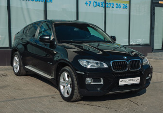 Подержанный автомобиль BMW X6 2013 года (7 фото)