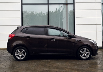 Подержанный автомобиль Kia Rio Hatchback 2015 года (6 фото)