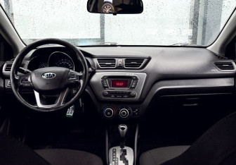 Подержанный автомобиль Kia Rio Sedan 2014 года (19 фото)